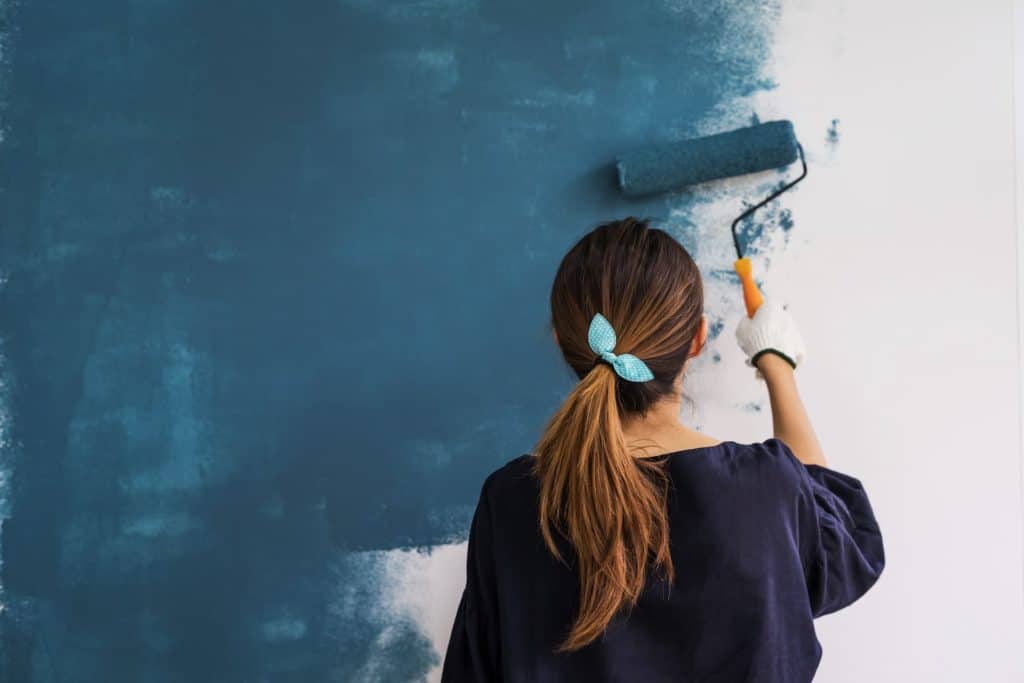 lady painting a wall